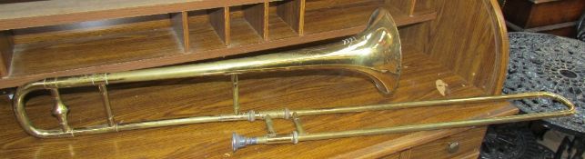 A brass trombone "Cambridge The British Band Instrument Co.