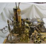 An electroplated menorah together with a brass example, brass candlesticks, fire irons,