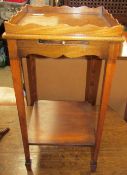 A George III mahogany night table with pull out slide