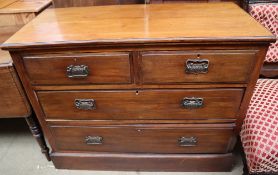 An Edwardian mahogany chest with two short and two long drawers and a plinth base