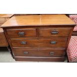 An Edwardian mahogany chest with two short and two long drawers and a plinth base