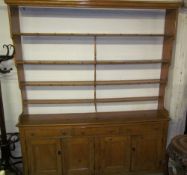 A 19th century stripped pine dresser,