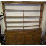 A 19th century stripped pine dresser,