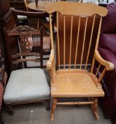 A spindle back rocking chair together with a nursing chair