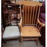 A spindle back rocking chair together with a nursing chair