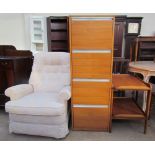 A teak tea trolley together with a filing cabinet and a reclining chair