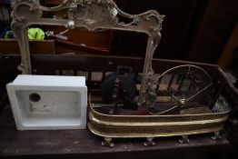 A brass fire guard together with a brass fan fire screen, a porcelain sink, picture frame,