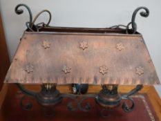 A copper ceiling light