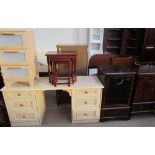 A modern dressing table together with a chest of drawers, nest of three tables,