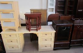 A modern dressing table together with a chest of drawers, nest of three tables,