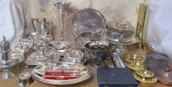A collection of electroplated wares including a large bud vase, swing handled cake baskets,