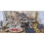 A collection of electroplated wares including a large bud vase, swing handled cake baskets,