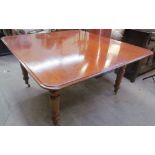 A Victorian mahogany dining table,