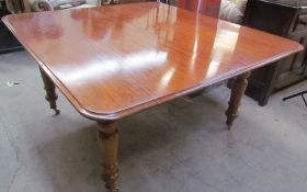 A Victorian mahogany dining table,