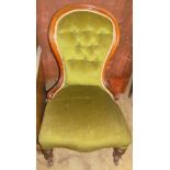 A Victorian walnut spoon back nursing chair