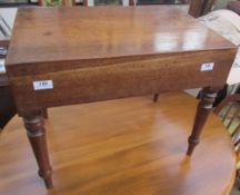 A 19th century mahogany bordaloue with a removable rectangular top on turned tapering legs