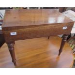 A 19th century mahogany bordaloue with a removable rectangular top on turned tapering legs