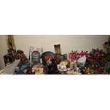 A large and extensive lot including shells, Mexican pottery, Mexican figures, pottery flowers,
