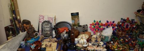 A large and extensive lot including shells, Mexican pottery, Mexican figures, pottery flowers,