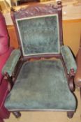 An Edwardian upholstered gentleman's library chair