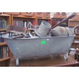 A tin bath together with a large quantity of tin watering cans, pails, jugs,