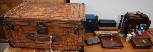 A Portuguese / Spanish leather trunk together with assorted boxes,