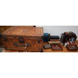 A Portuguese / Spanish leather trunk together with assorted boxes,