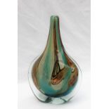 A Mdina axe head glass vase with scrolling browns and greens,