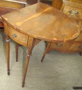 A 20th century yew wood Pembroke type occasional table of oval form with two cross-banded drop