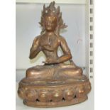 A large bronze figure of a seated buddhistic figure