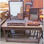 A 20th century oak console table together with two Victorian mahogany toilet mirrors