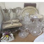 A pair of electroplated and glass claret jugs together with an electroplated tray and matching