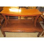 A Chinese carved hardwood coffee table of rectangular form,