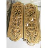 A collection of gilt metal pierced finger plates