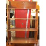 A mahogany waterfall hanging shelves with four shelves