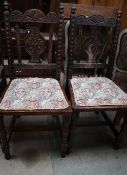 A pair of 19th century carved oak dining chairs