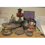 A cranberry glass oil lamp together with assorted electroplated items and costume jewellery