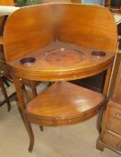 A George III mahogany corner washstand,