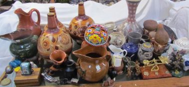 A beadwork mask together with Mexican pottery, letter scales,