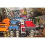 Model tractors together with a mirror, electroplated vases, pewter mugs,