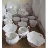 A Shelley Bridal Rose pattern part tea set together with another Shelley bone china part tea set