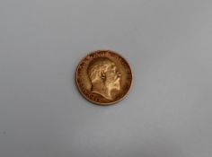 An Edward VII gold half sovereign,