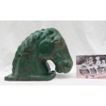 A Bonny Bright Eves cast iron playground horses head, painted in green,