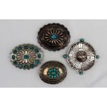 An American Indian white metal and turquoise set belt buckle, marked sterling,