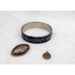 A blue enamel and white metal hinged bangle, "Remember Me", stamped "AP",