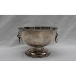 An Elizabeth II silver pedestal bowl with lion mask and ring handles on a pedestal base, Birmingham,