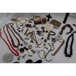 Assorted costume jewellery, including necklaces, brooches, pendants,