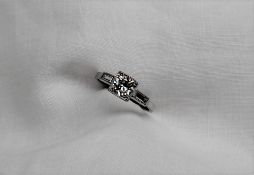 A solitaire diamond ring, the old round cut diamond approximately 0.