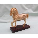 A gilt bronze model of a horse, modelled on one of the four horses of Saint Mark's Basilica,