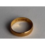 A 22ct yellow gold wedding band, approximately 1.